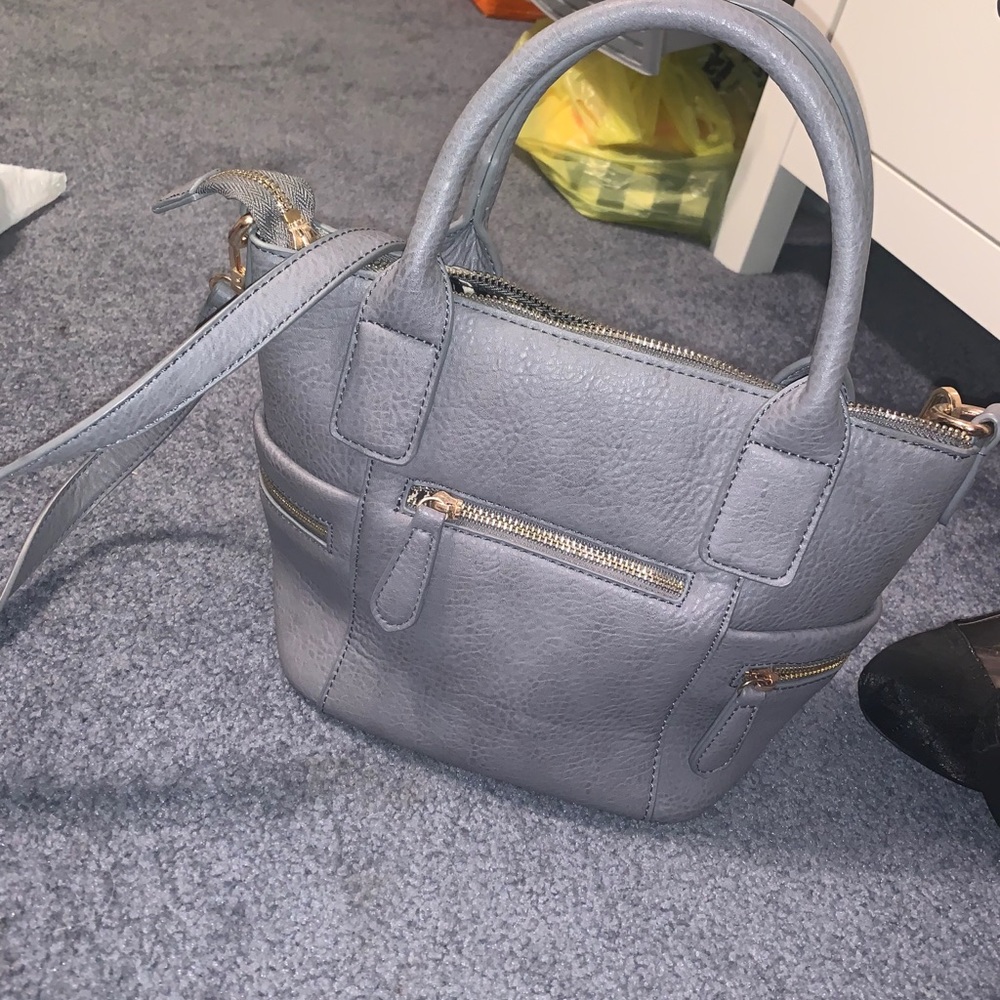 Crossbody or wrist carry purse